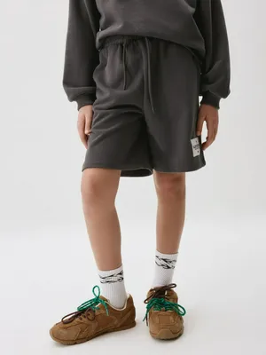 Удлиненные трикотажные шорты SELA для девочек, серый, арт. 34062