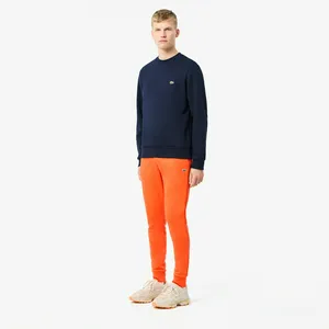 Мужские спортивные брюки Lacoste Slim Fit, оранжевый, арт. XH9624