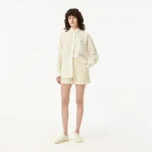 Женские короткие однотонные шорты Lacoste, белый, арт. FF0401
