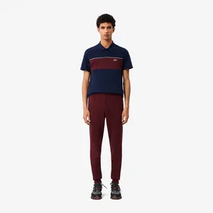 Мужские спортивные брюки Lacoste Slim Fit, красный, арт. XH9624