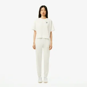 Женские флисовые спортивные брюки Lacoste, белый, арт. XF2566